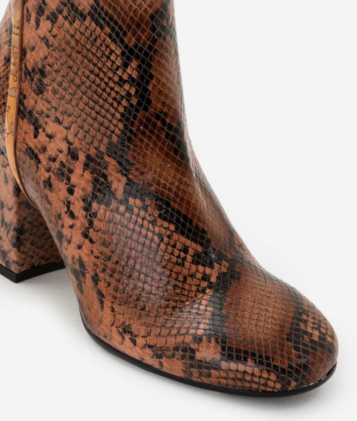 Ankle boots in leather with python print Brown