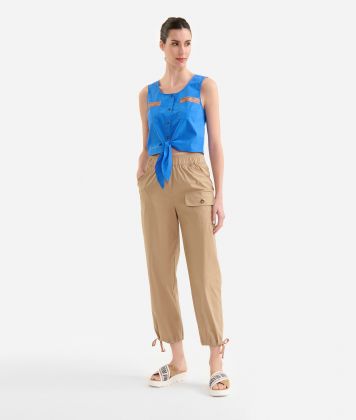 Technical popeline sleeveless shirt with knot Bluette